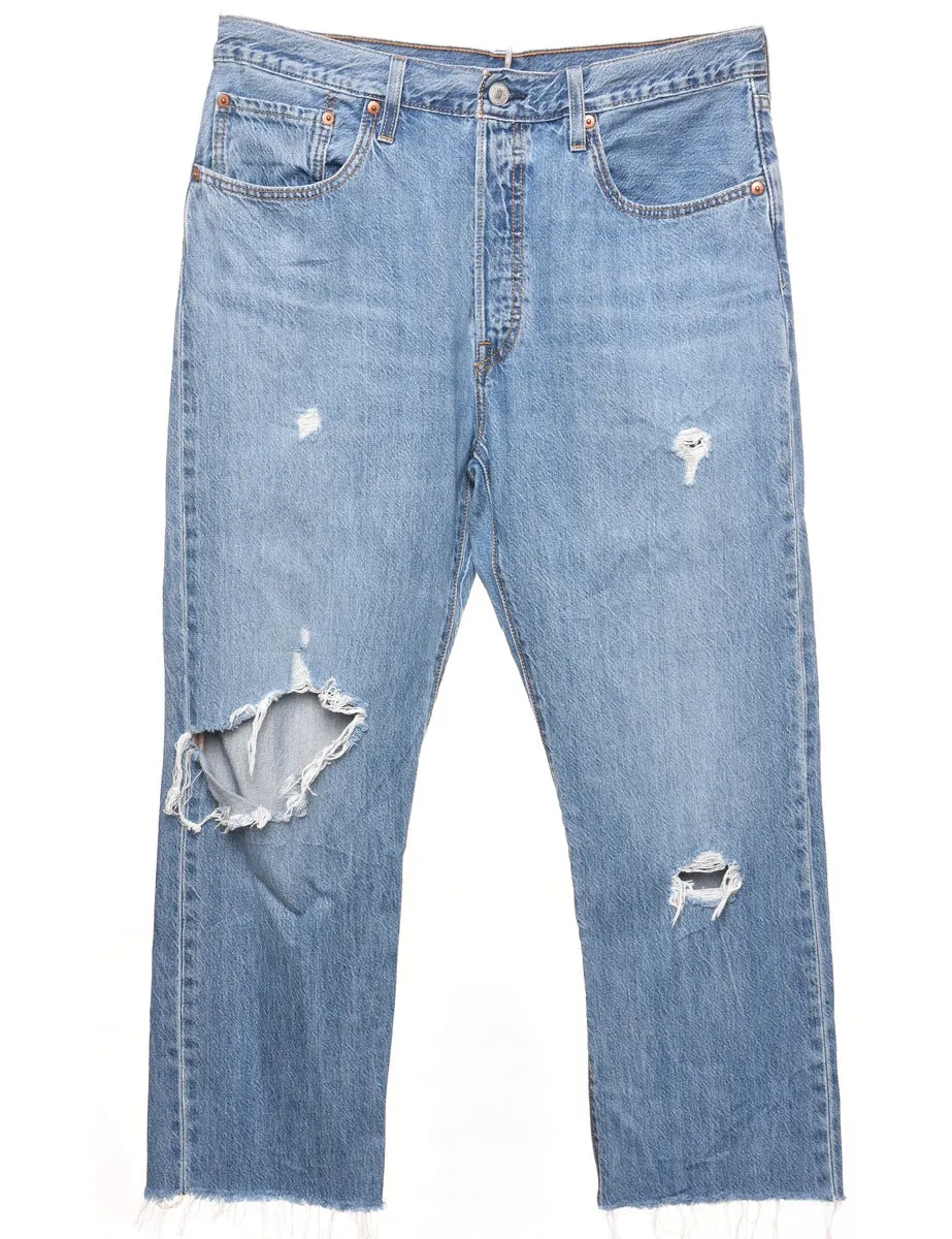 Distressed Light Wash Ripped Levi's Jeans - W33 L26